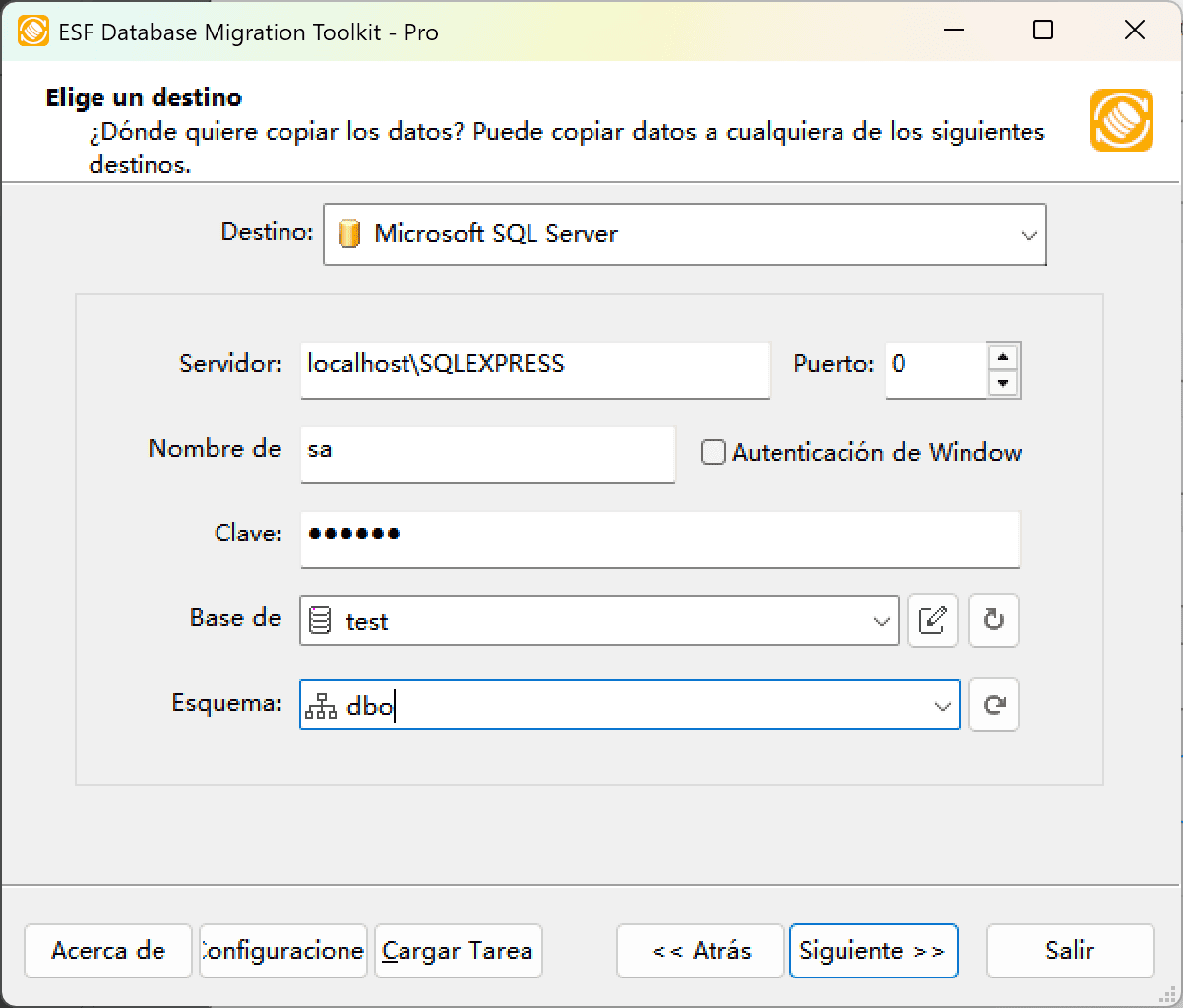 Cuadro de diálogo &quot;Elegir un Destino&quot; mostrando opciones de configuración Microsoft SQL Server incluyendo nombre de host, autenticación, base de datos y ajustes de esquema